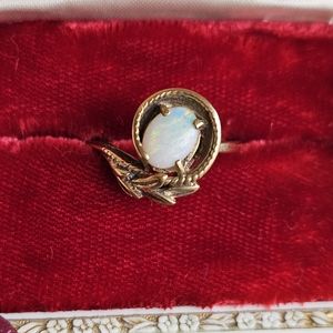 Vintage 10k opal ring size 7.5. Stamped 10k. Can be resized by a jeweler. Great